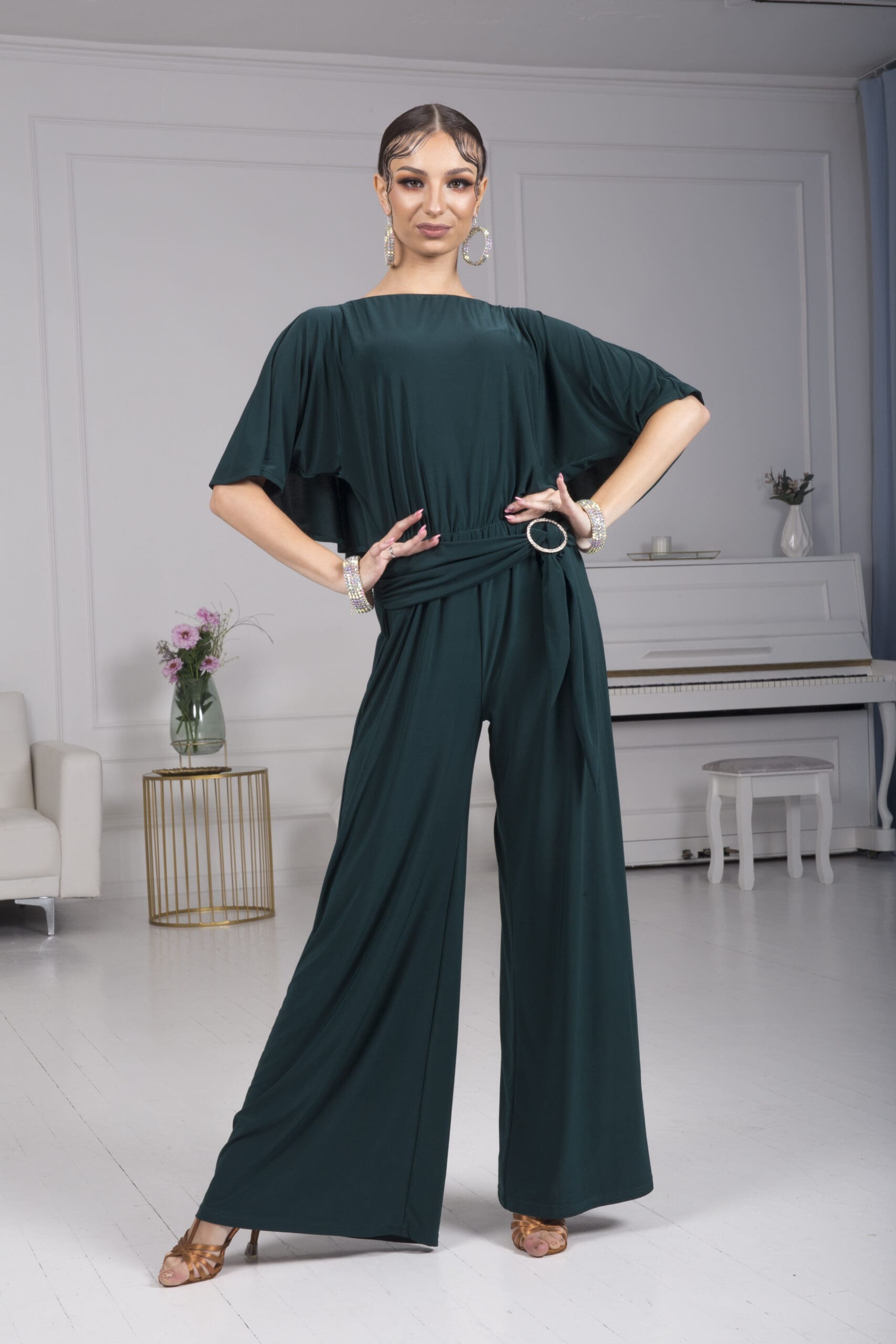 Elegant green dance jumpsuit for women, showcasing a flowing design.